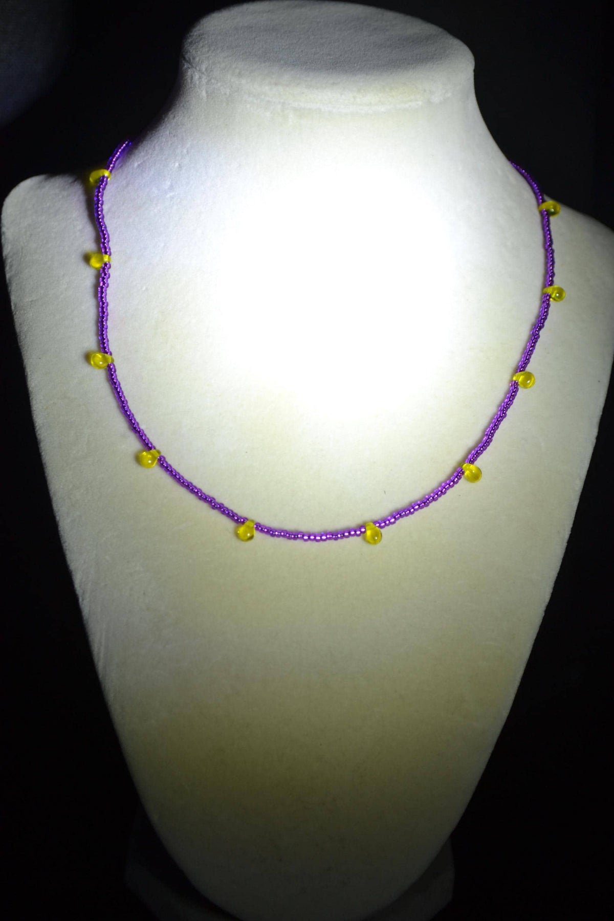 Multicolor glass bead necklace. Purple and yellow drops