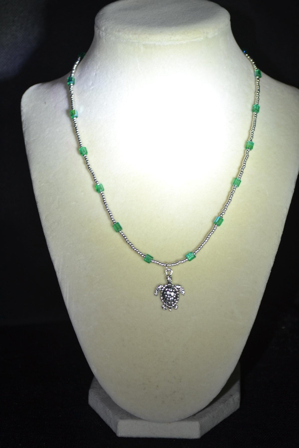 Silver Turtle pendant glass bead necklace. Aqua and silver