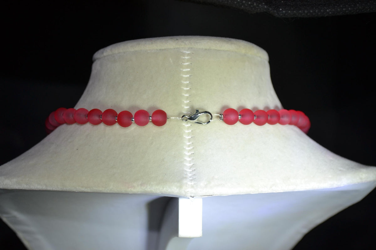 Green Monstera pendant glass bead choker. Frosted Red and silver