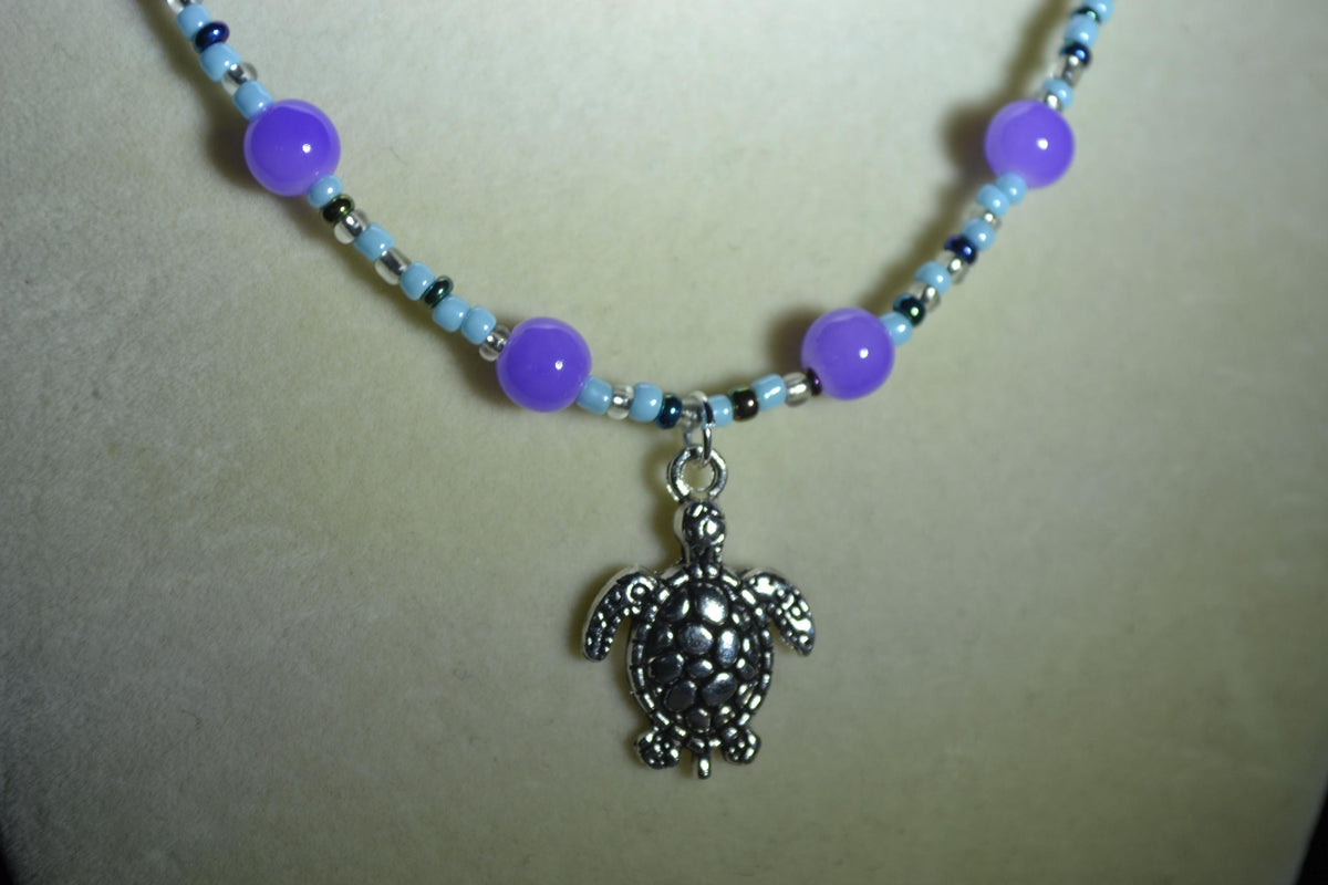 Silver Turtle pendant glass bead necklace. Deep sea
