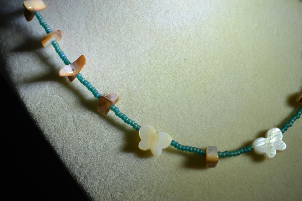 Multicolor glass bead necklace. Teal, brown abalone, white butterfly abalone