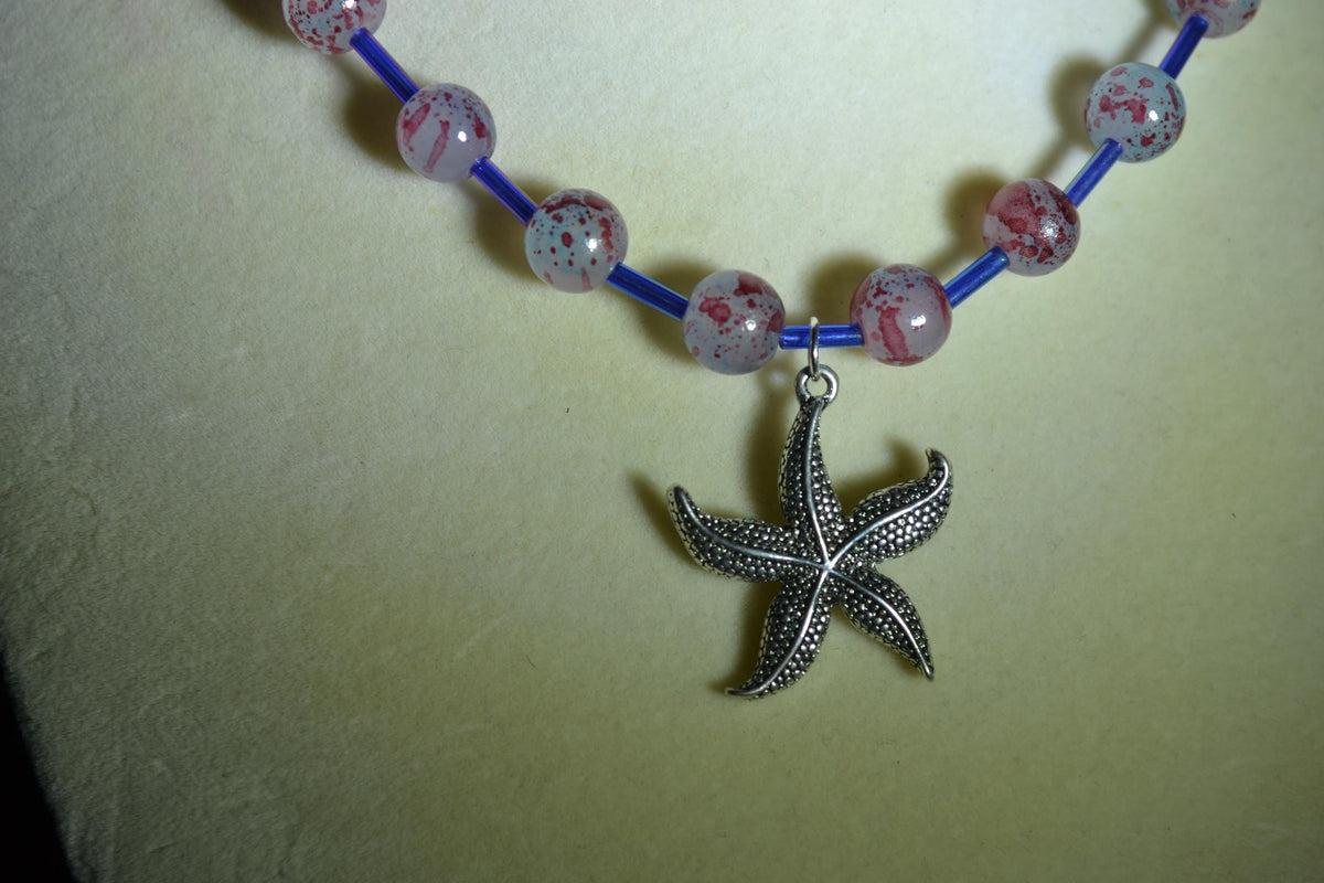 Silver Starfish pendant glass bead choker. Blue and red