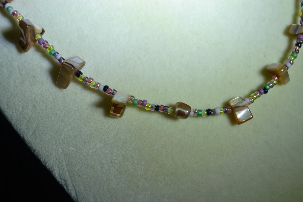 Multicolor glass bead necklace. Brown abalone and diluted rainbow