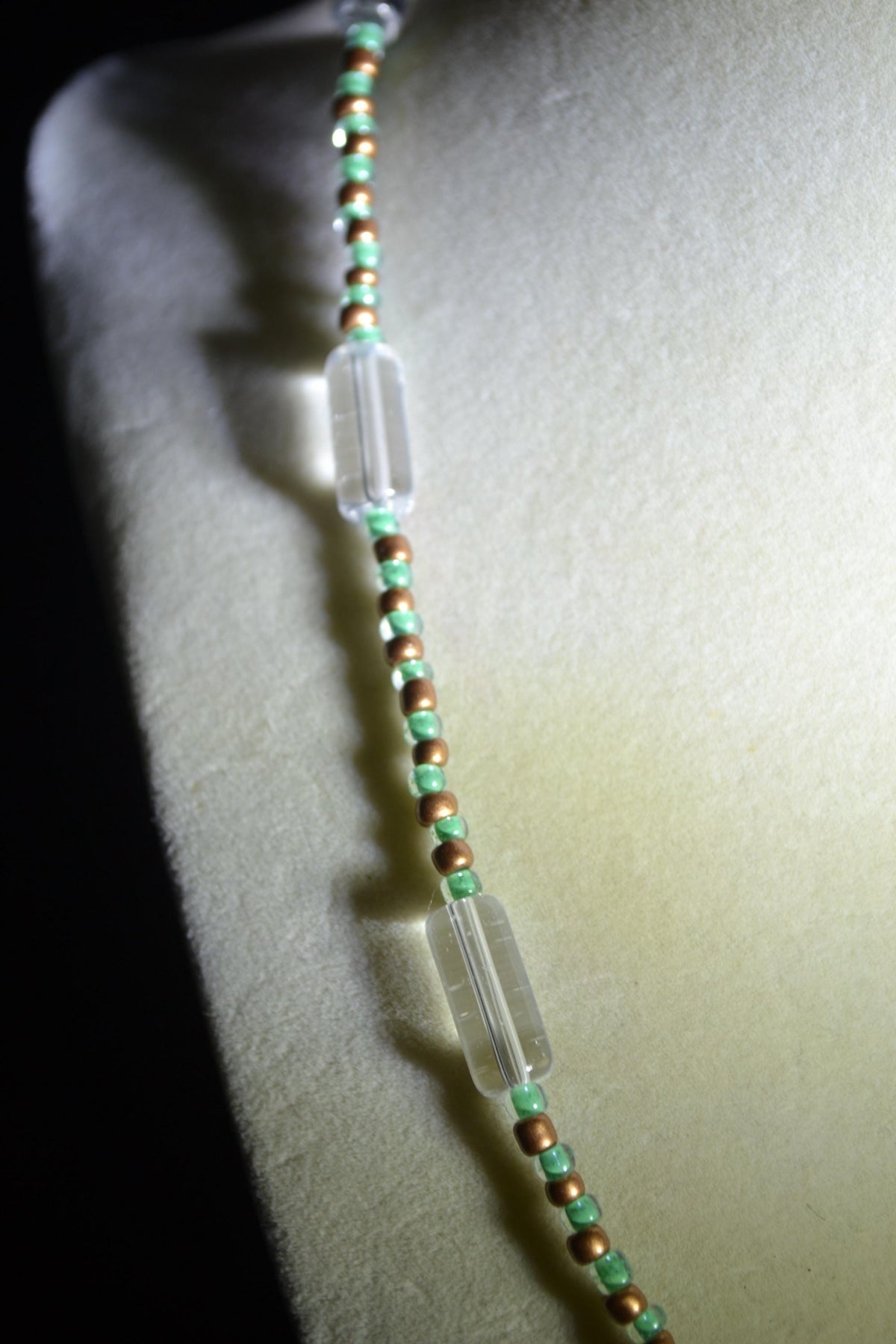 Multicolor glass bead necklace. Bronze and teal