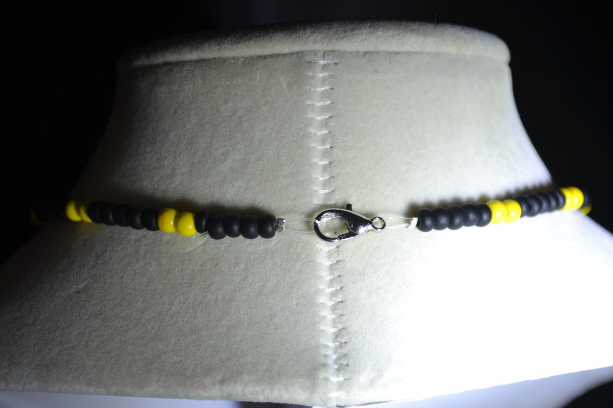 Silver and turquoise cactus pendant glass bead necklace. Black and yellow