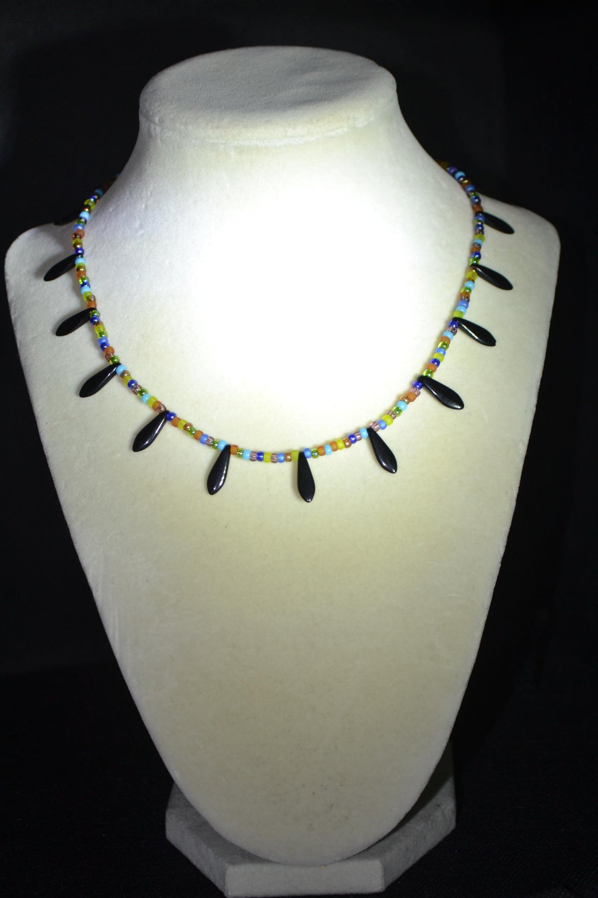 Multicolor glass bead choker. Black daggers and stained glass