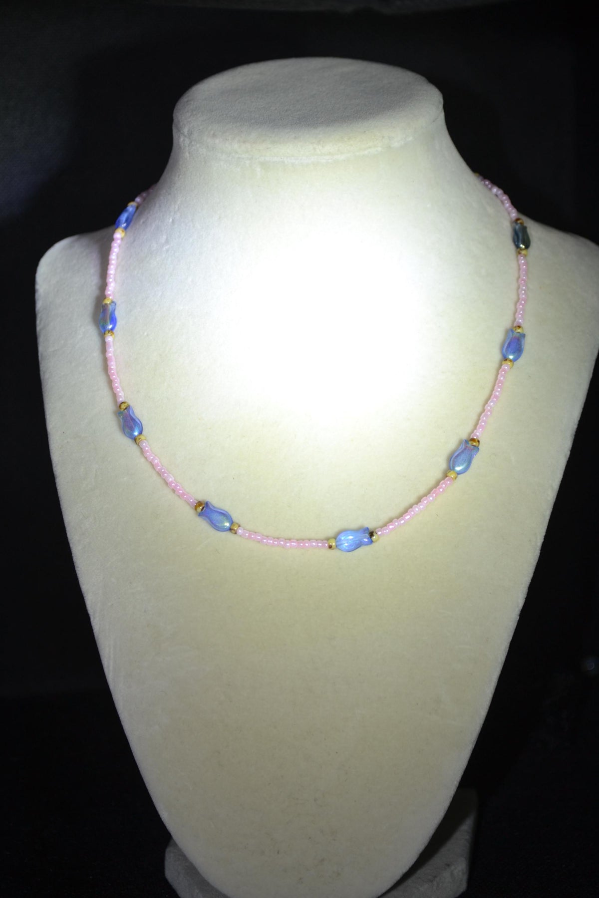 Beaded fish necklace. Pearl pink, iridescent blue, and Picasso