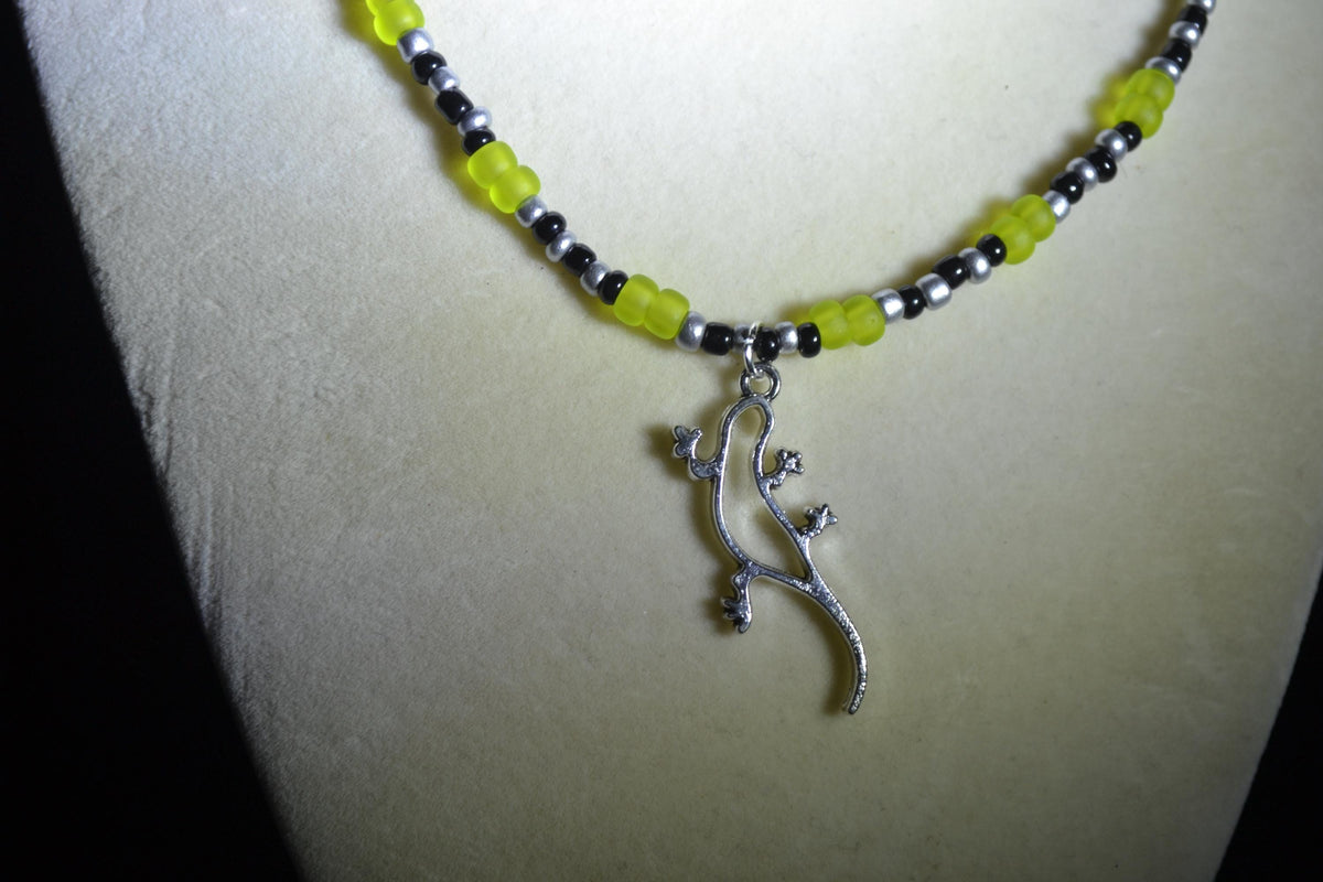 Silver gecko pendant glass bead necklace. Black, silver, and frosted green
