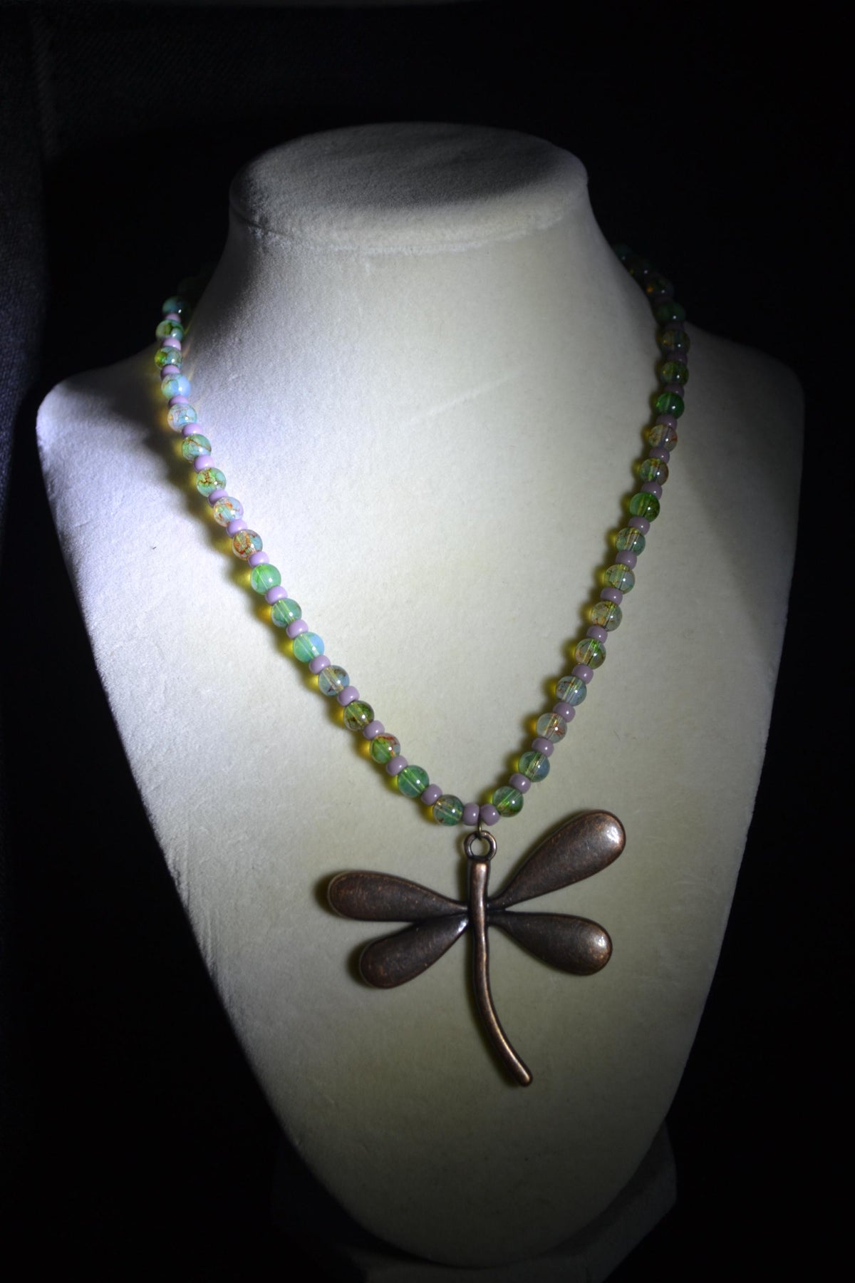 Bronze Dragonfly pendant glass bead necklace. Green and purple