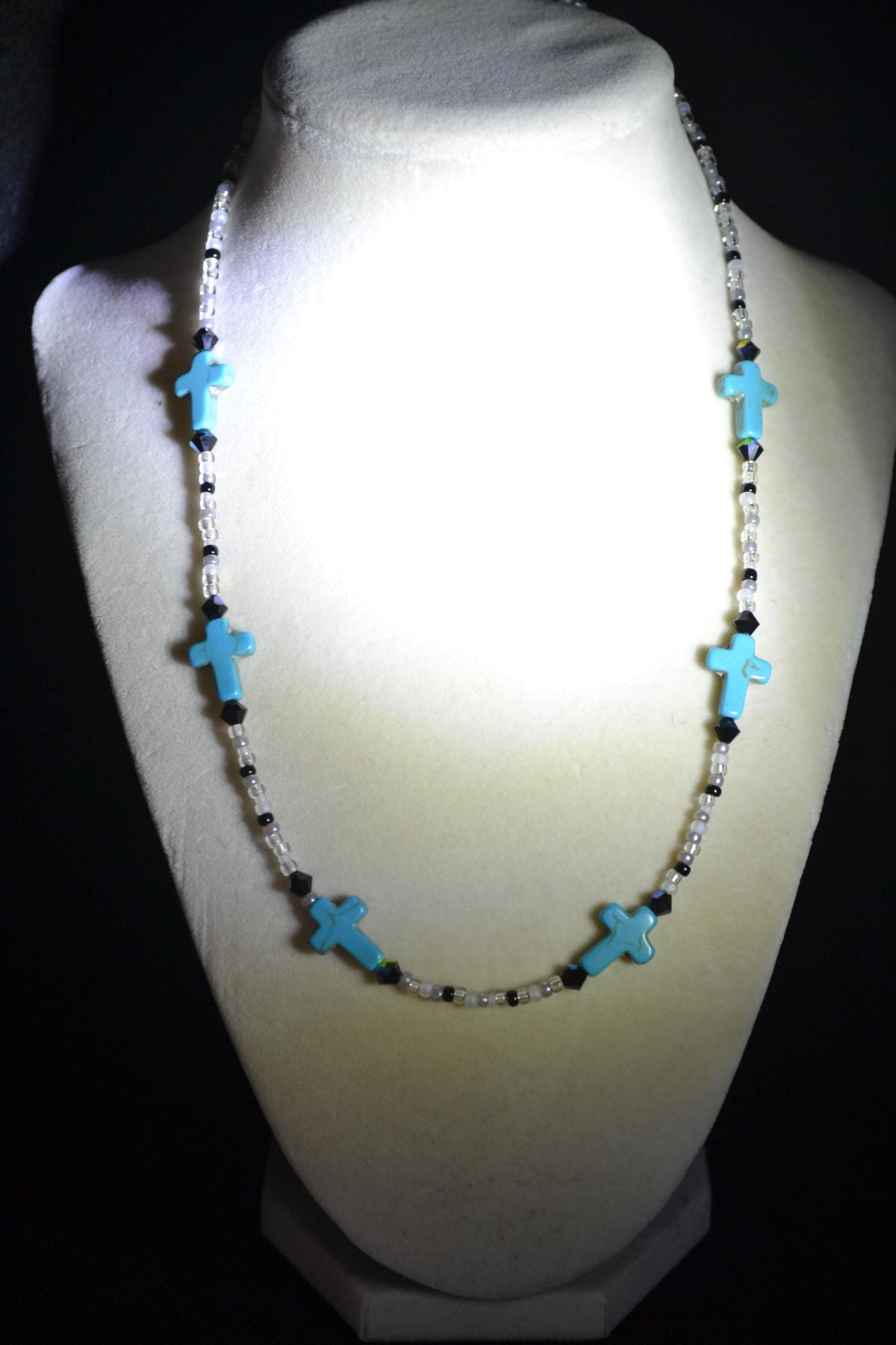Beaded Cross glass necklace. Turquoise, white, and black