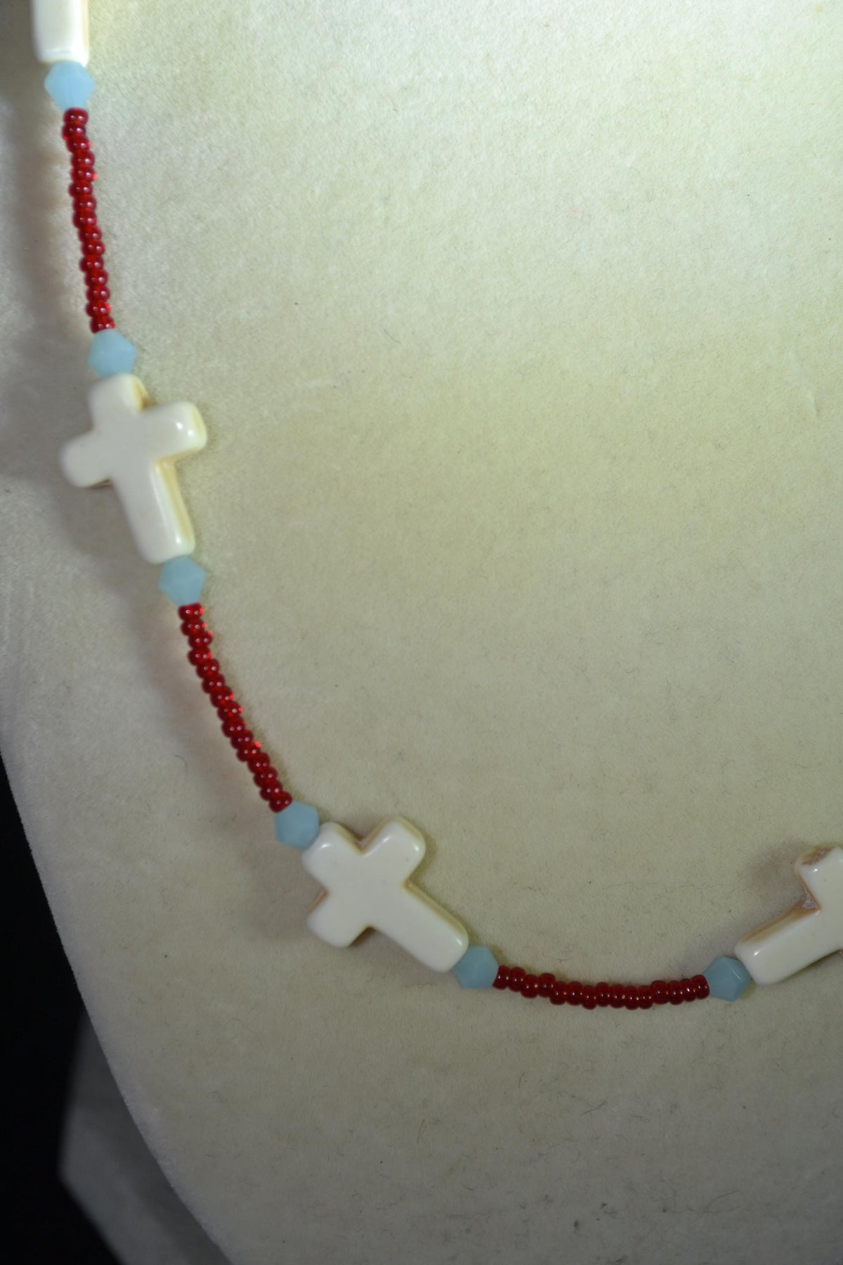 Beaded Cross glass necklace. Red, white, and blue