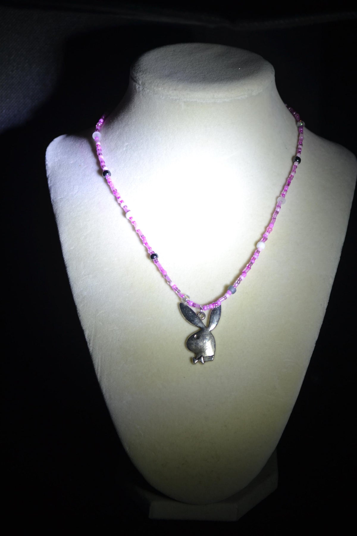 Silver Playboy pendant glass bead necklace. Mixed pinks