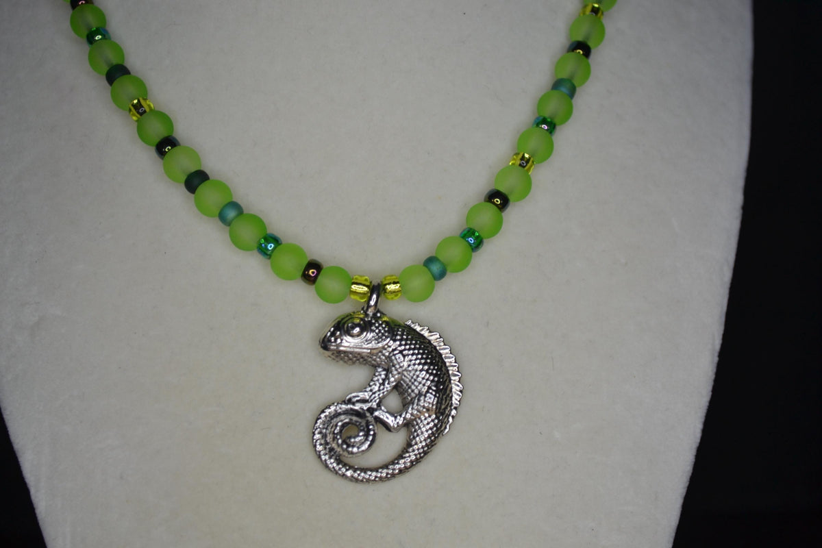 Silver Chameleon pendant glass bead necklace. Greens
