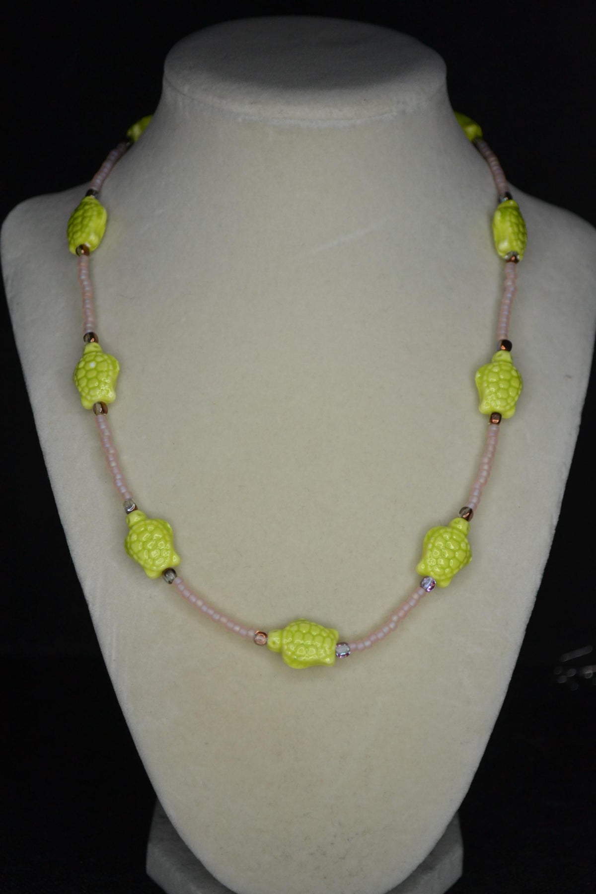 Beaded Sea Turtle necklace. Frosted pink, amber, and green