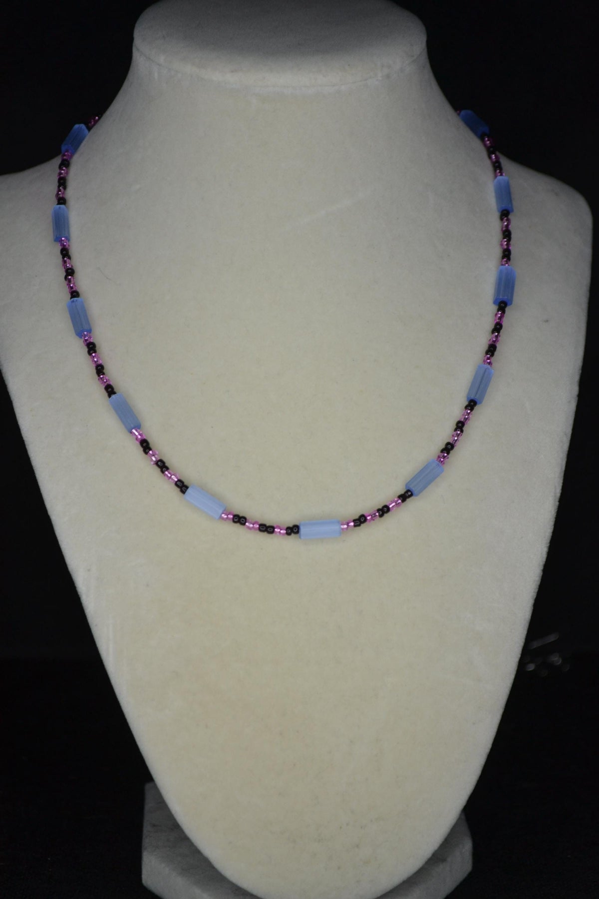 Multicolor glass bead necklace. Blue cat eye, pink, and black