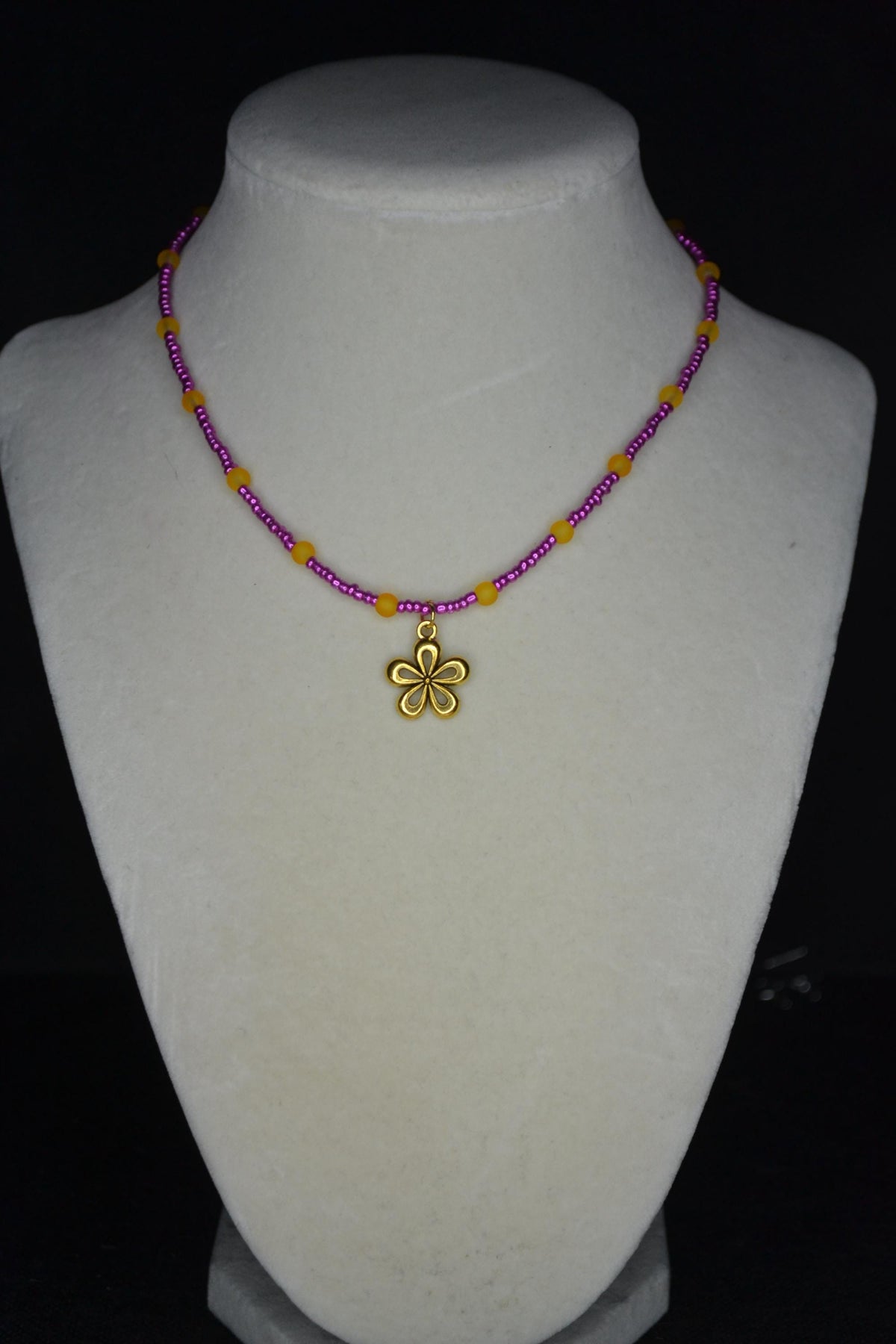 Gold flower pendant glass bead choker. Metallic pink and frosted orange