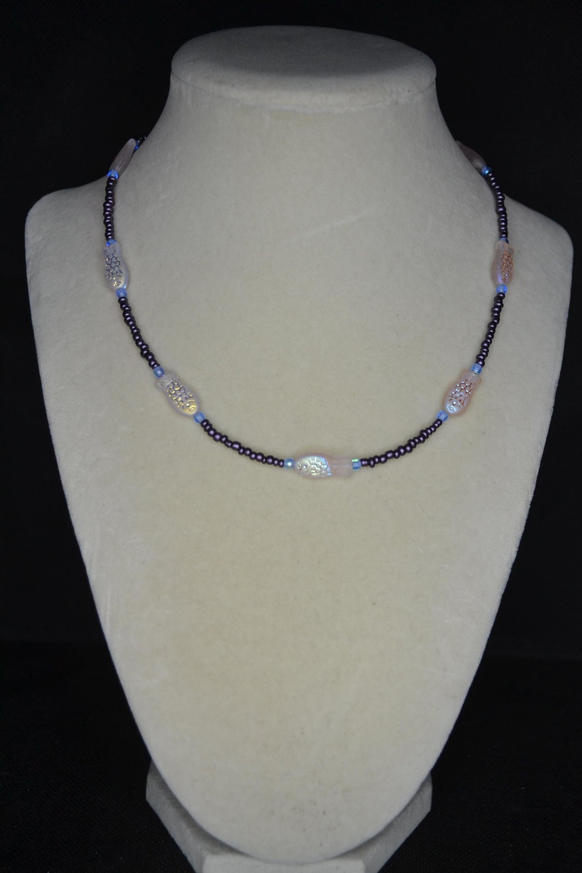 Beaded fish necklace. Blue, metallic purple, and iridescent