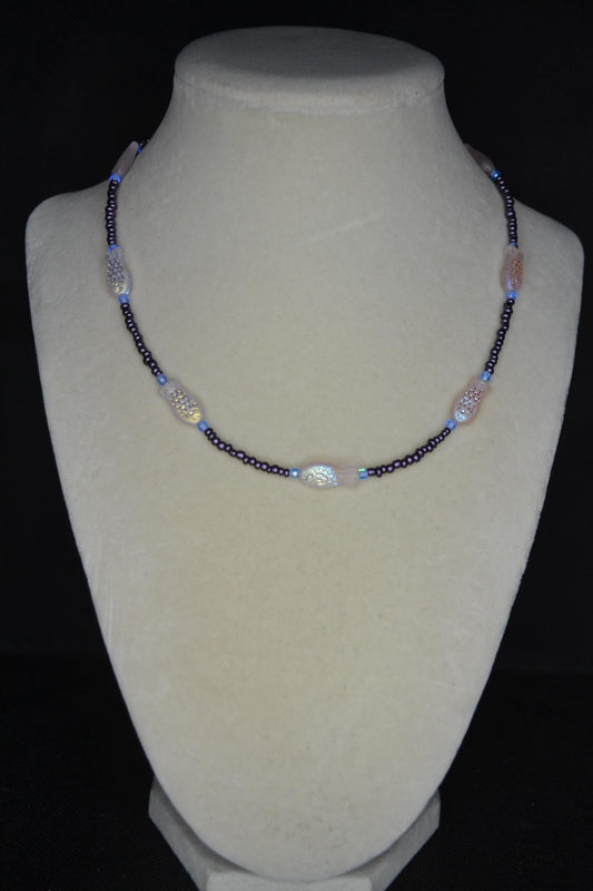 Beaded fish necklace. Blue, metallic purple, and iridescent