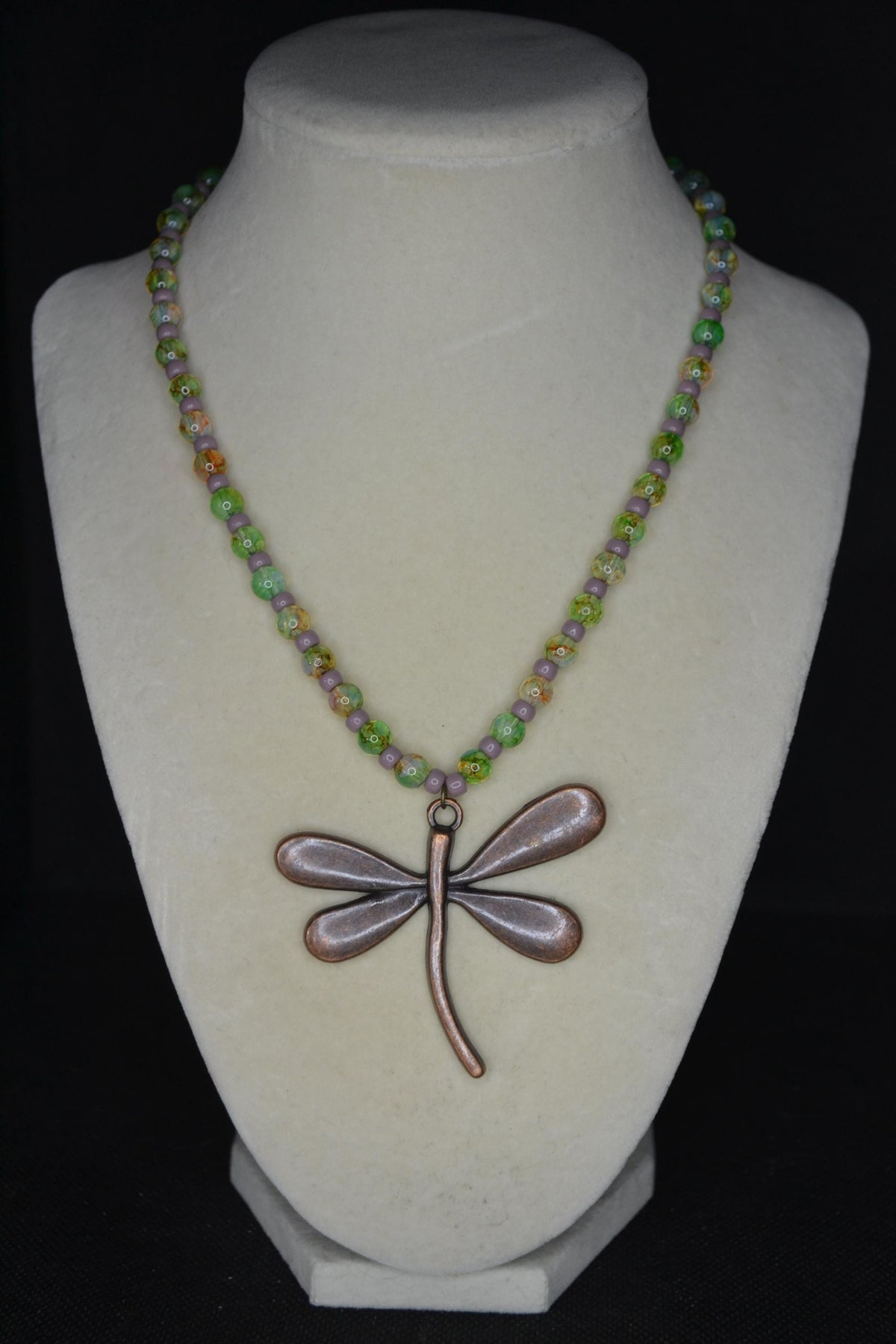 Bronze Dragonfly pendant glass bead necklace. Green and purple