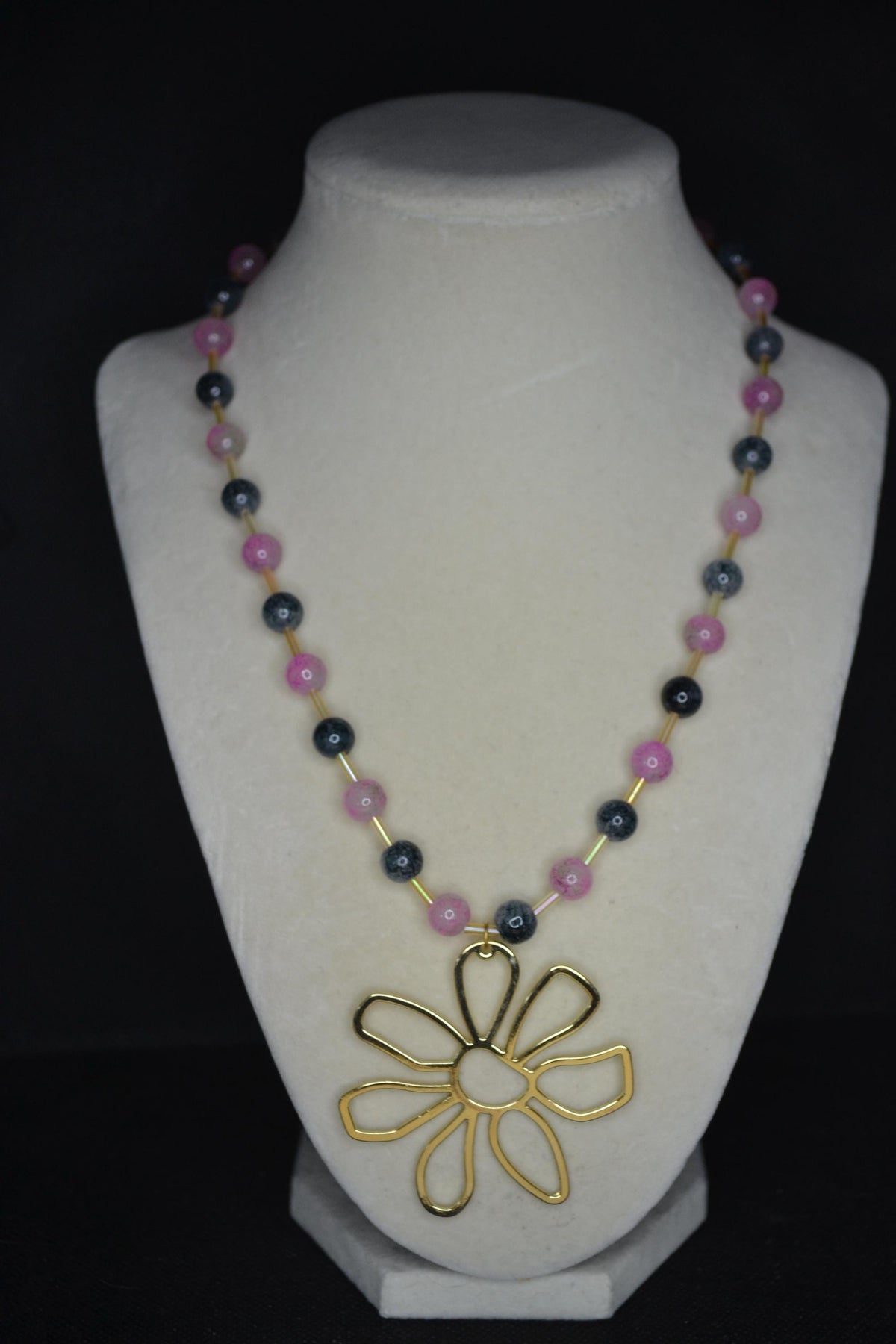 Gold Flower pendant glass bead necklace. Pink, black, and champagne