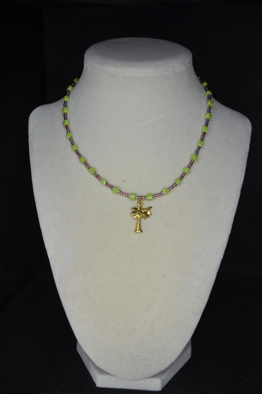 Gold Palm tree pendant glass bead necklace. Amethyst and lime