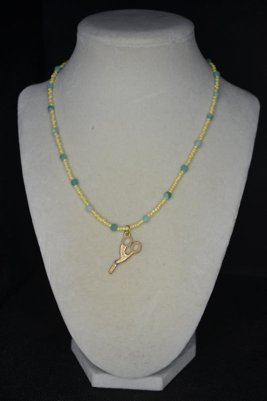 Gold scissor pendant glass bead necklace. Yellow and jade