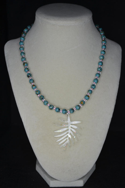 Iridescent philodendron pendant glass bead necklace. Turquoise and pink