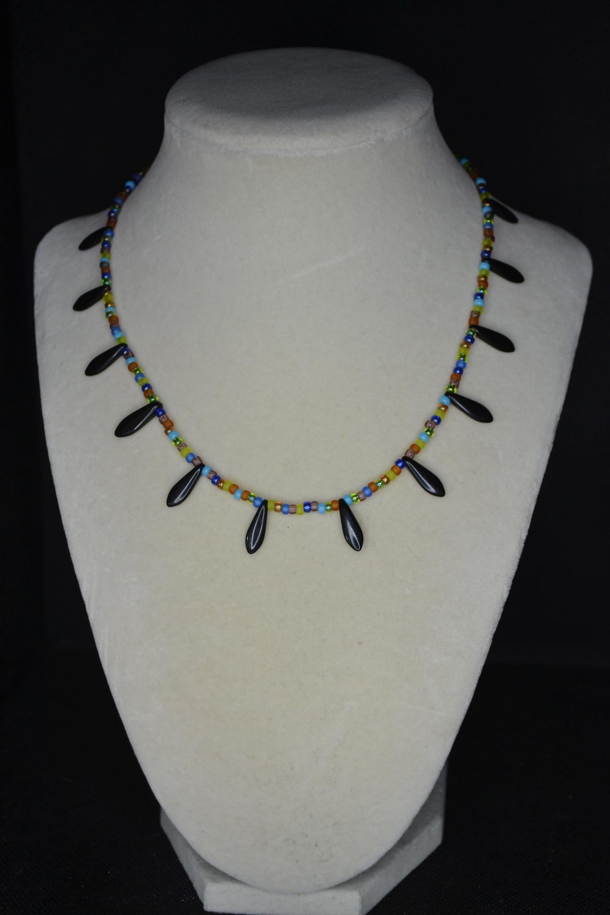 Multicolor glass bead choker. Black daggers and stained glass