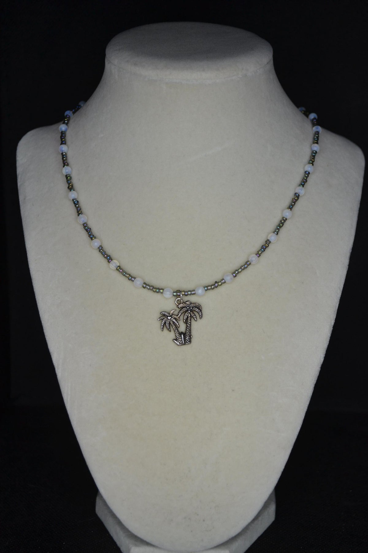 Palm tree pendant glass bead necklace. Oil spill and moonstone