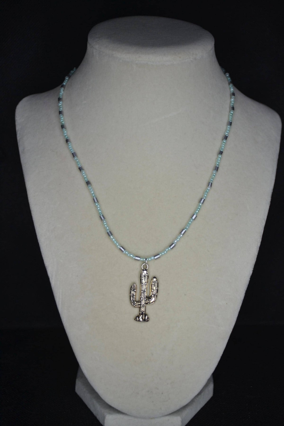 Silver Cactus pendant glass bead necklace. Pearl green and silver