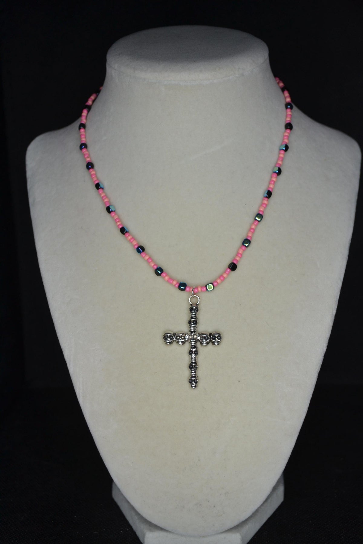 Silver Skull Cross pendant glass bead necklace. Coral, pink, and metallic black