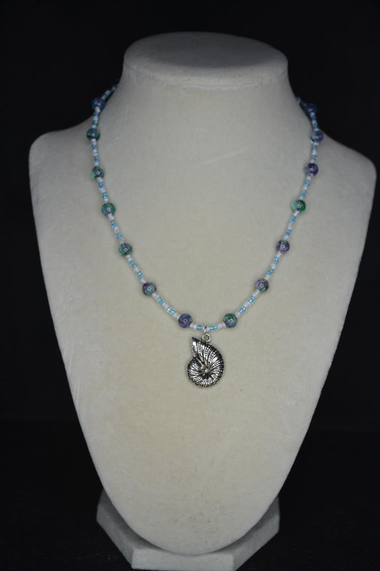 Silver Snail Shell pendant glass bead necklace. Blues and white