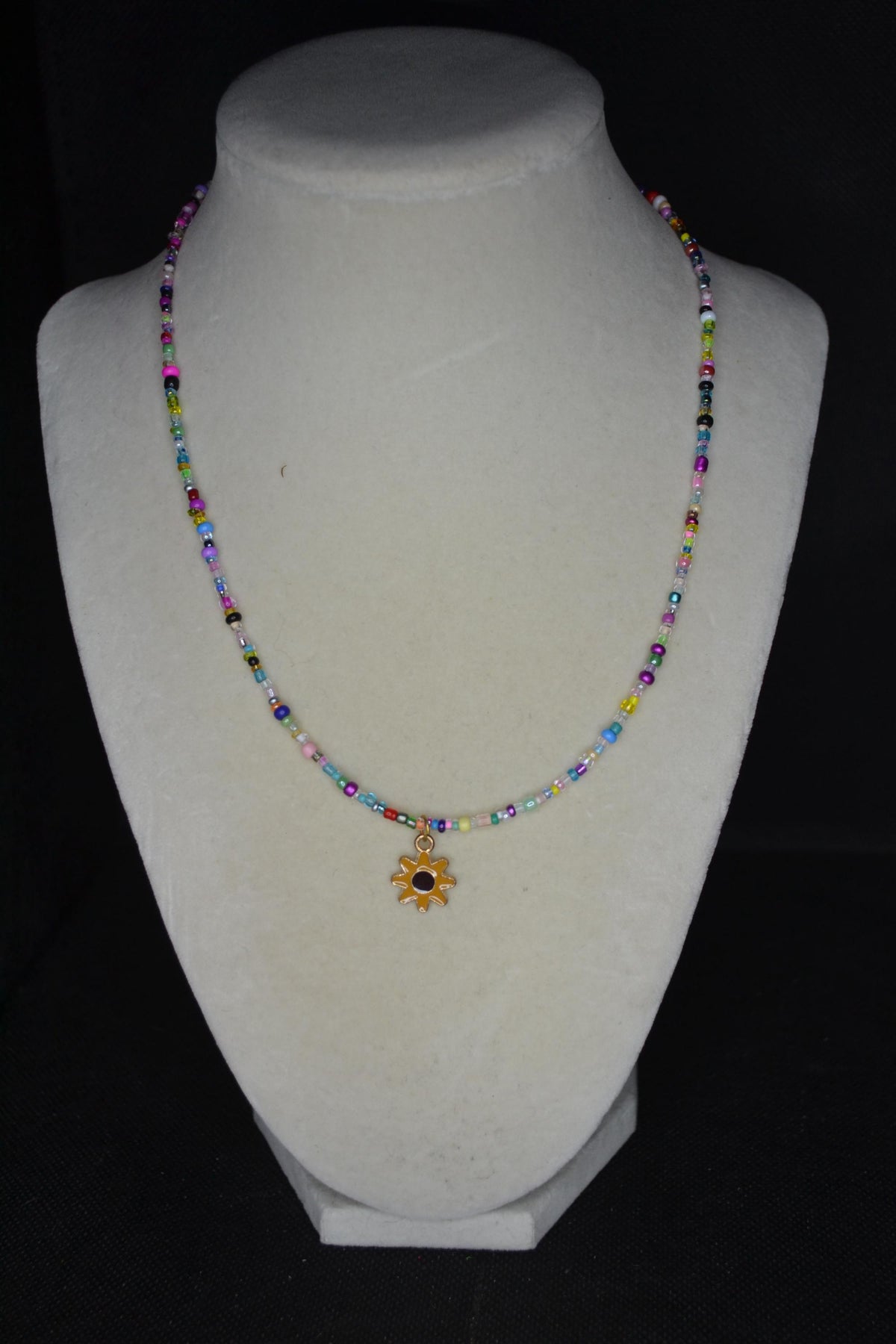Sunflower pendant glass bead necklace. Rainbow