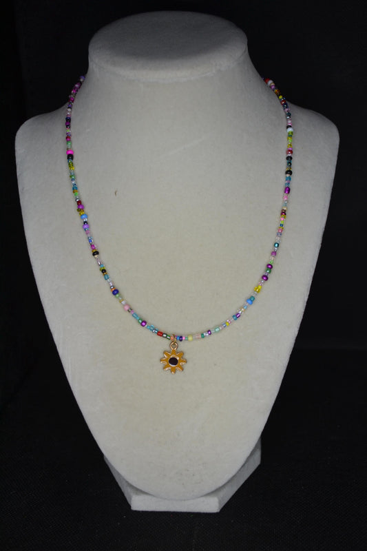 Sunflower pendant glass bead necklace. Rainbow