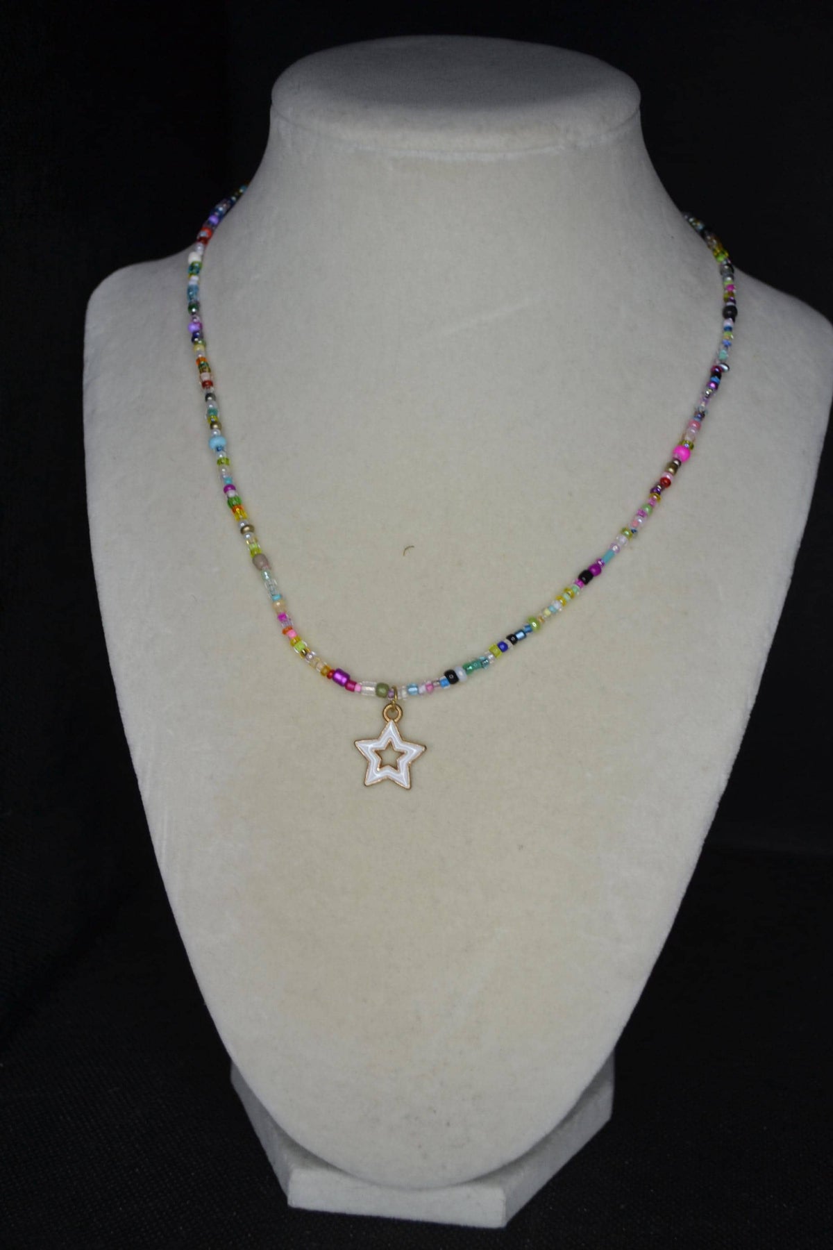 White star pendant glass bead necklace. Rainbow