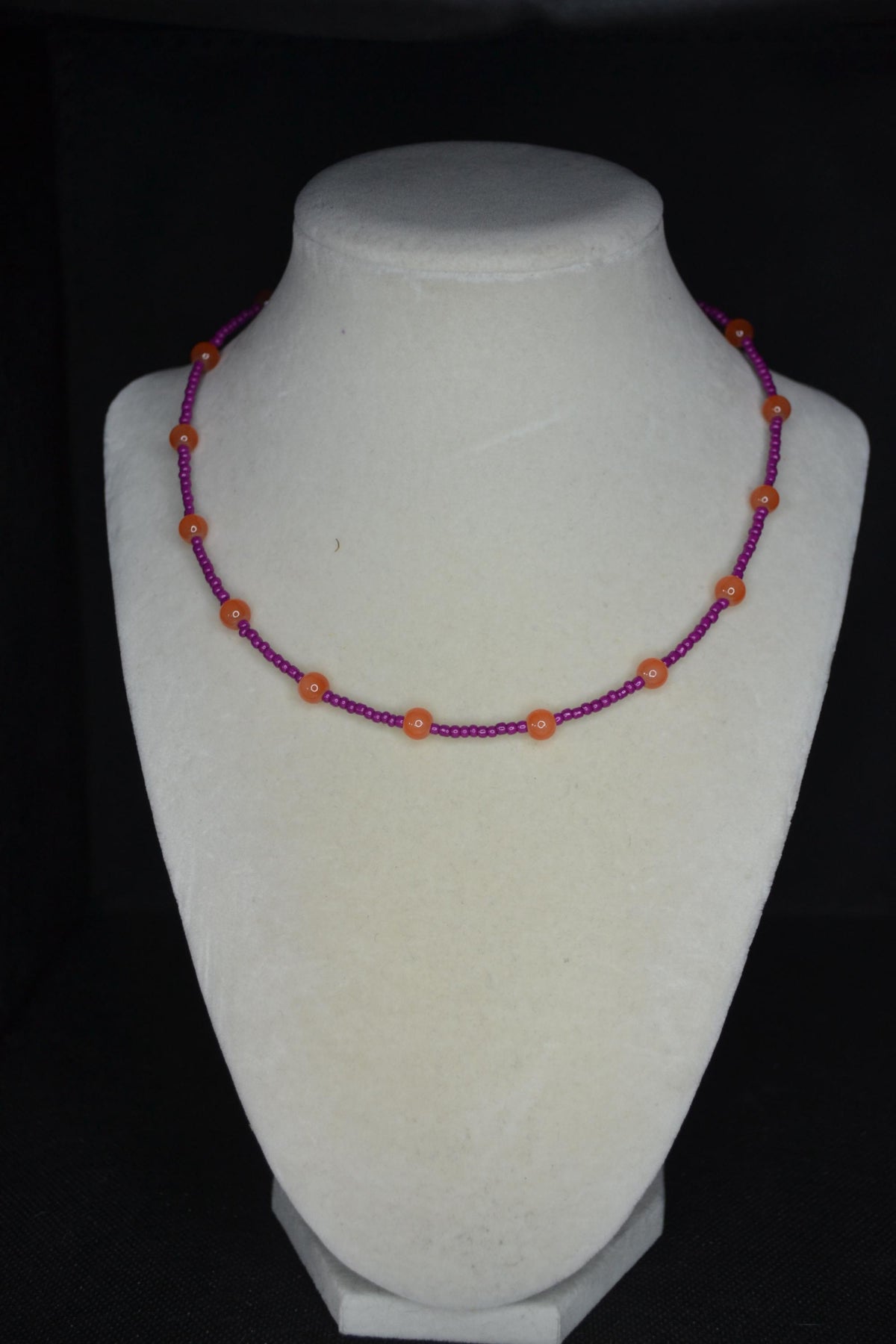 Multicolor glass bead necklace. Orange and berry