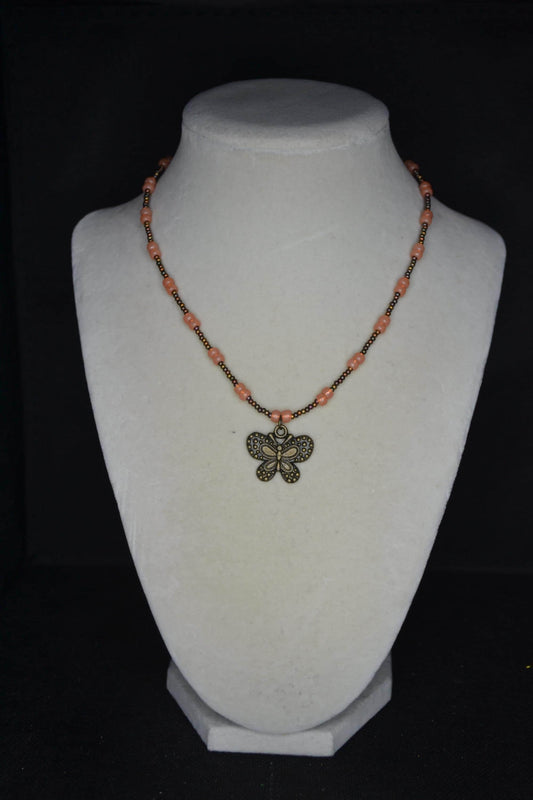 Bronze butterfly pendant glass bead necklace. Bronzes and coral