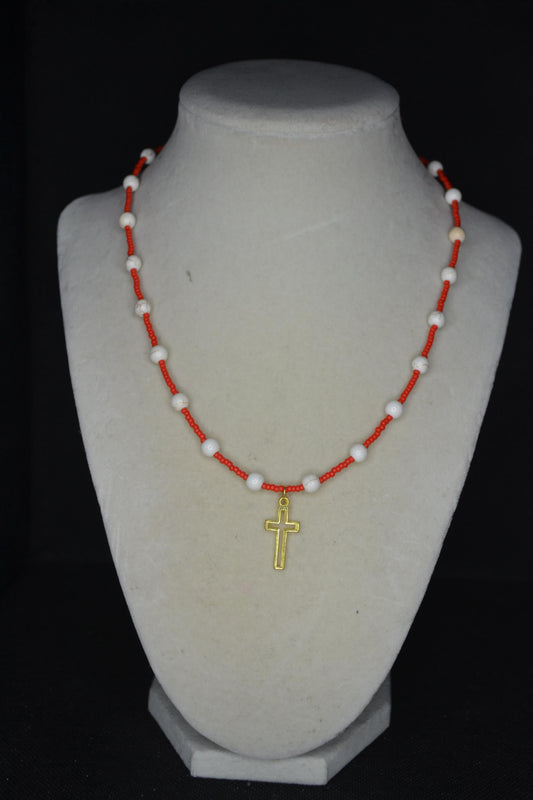 Gold cross pendant glass bead necklace. Red and white