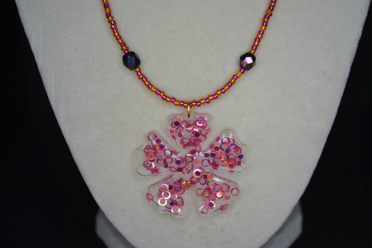 Y2K Flower Pendant Beaded Necklace. Fuschia, brown, and metallic black