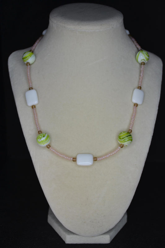Multicolor glass bead necklace. Frosted rose, green swirls, and white tiles.