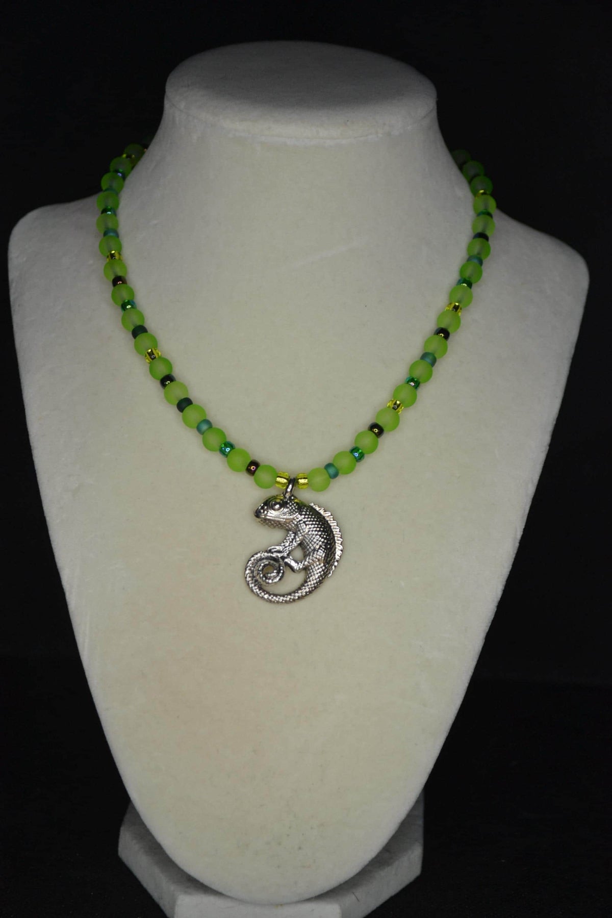 Silver Chameleon pendant glass bead necklace. Greens