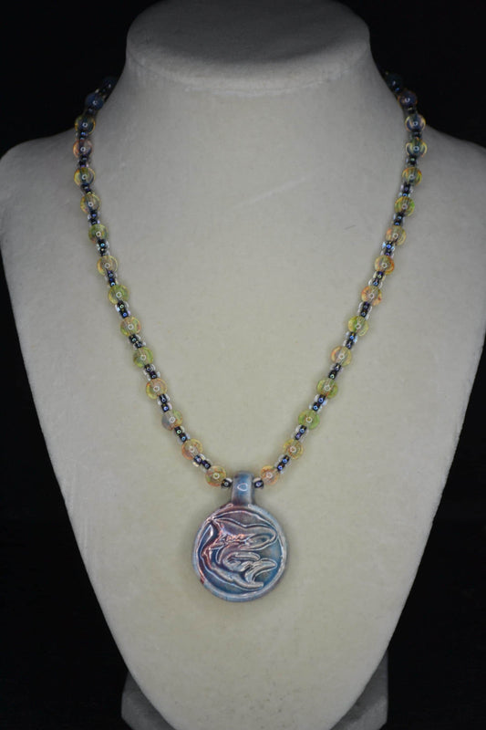 Ceramic shark pendant glass bead necklace. Topaz and black