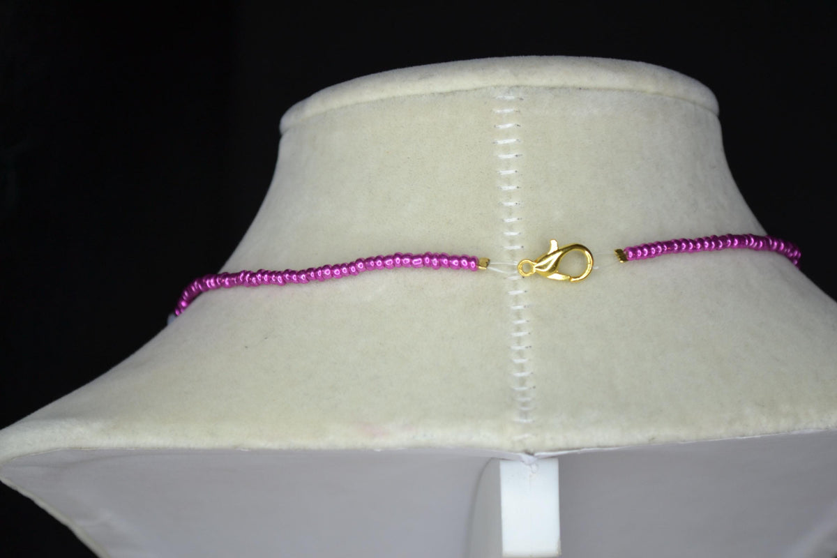 Multicolor glass bead necklace. Metallic pink, frosted grey, and milky white