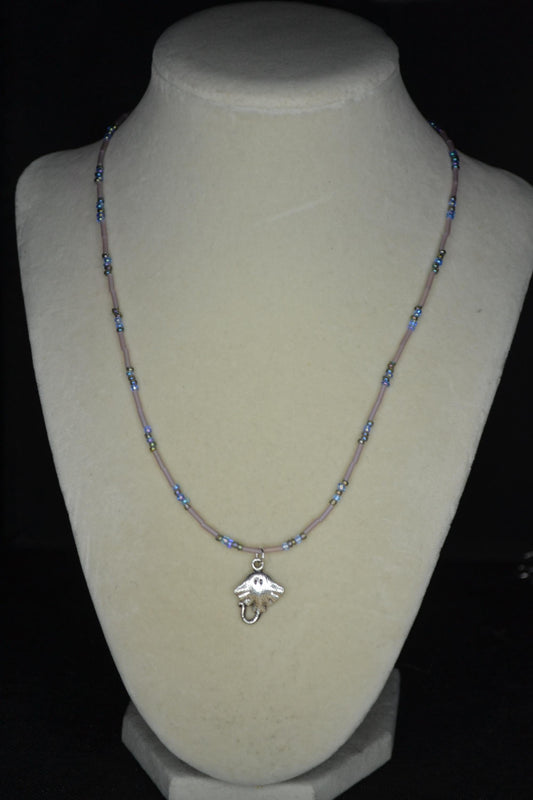 Silver Stingray pendant glass bead necklace. Blues and frosted rose