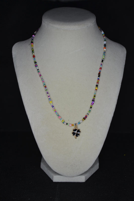 Black clover pendant glass bead necklace. Rainbow