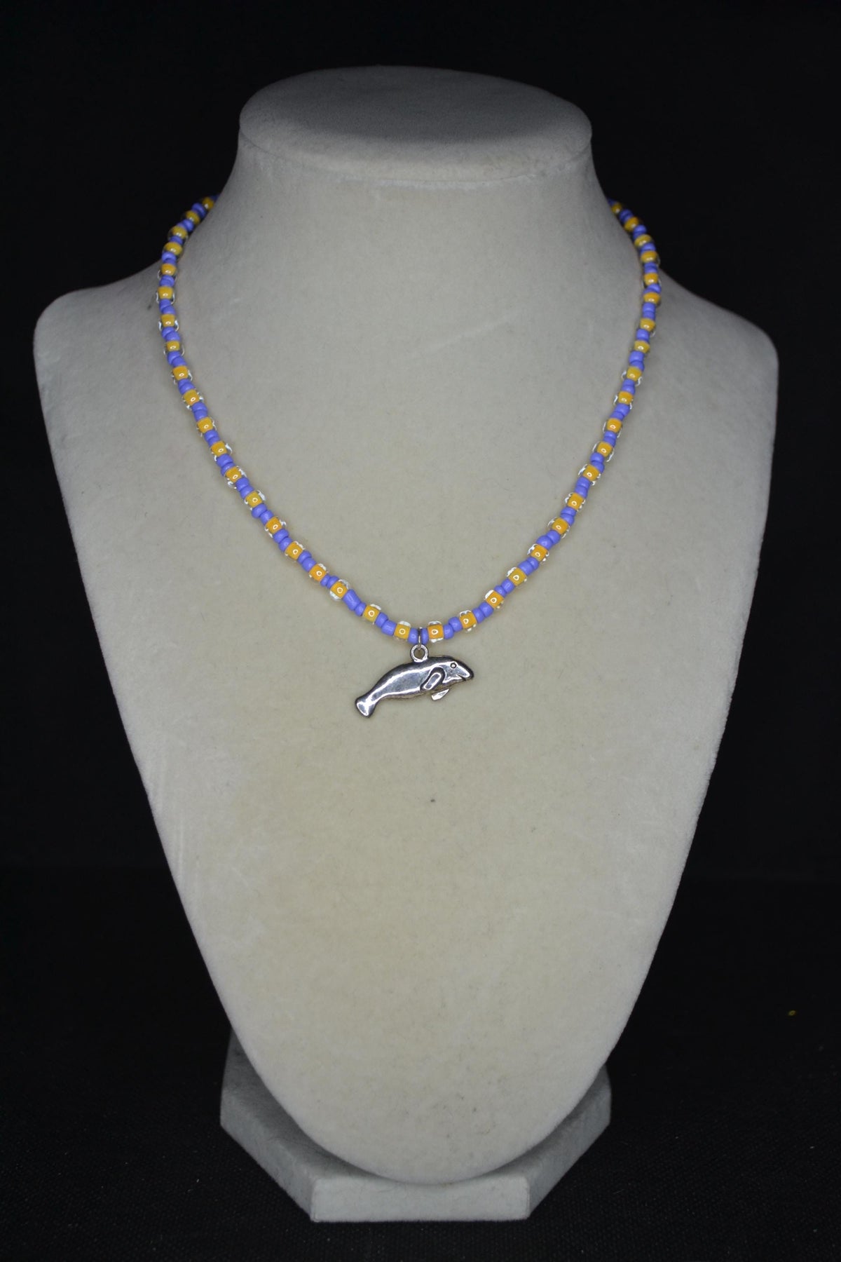 Manatee pendant glass bead necklace. Periwinkle and yellow