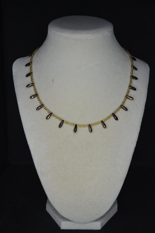 Multicolor glass bead necklace. Garnet and gold drops