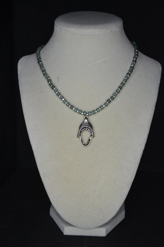 Silver Shark jaws pendant glass bead necklace. Frosted blue & silver