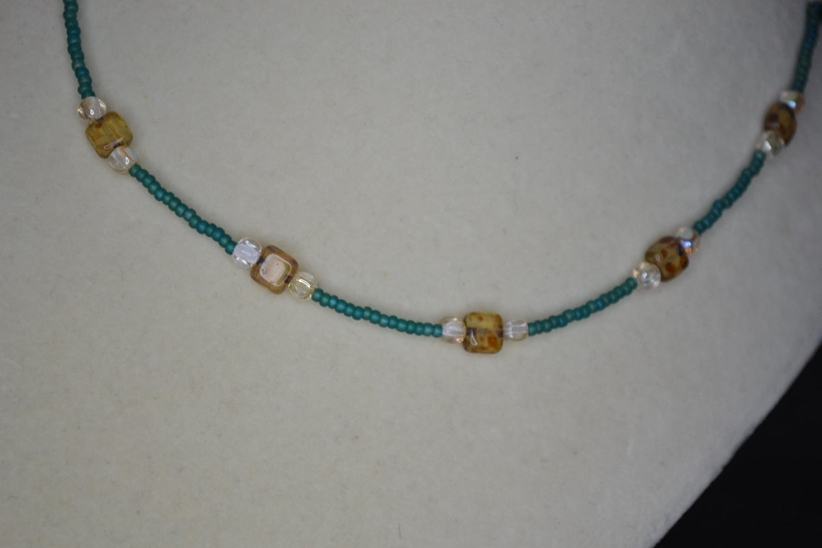 Multicolor glass bead choker. Brown tortoise, champagne, and teal