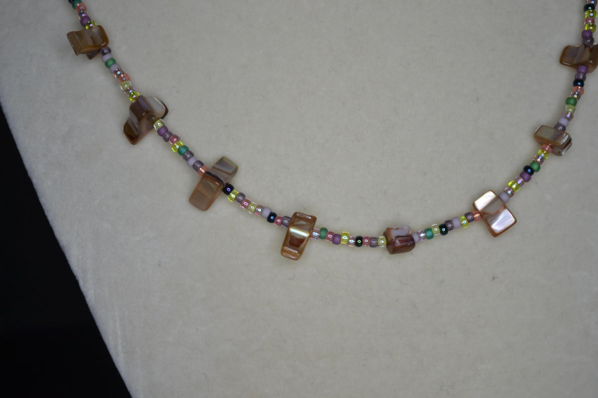 Multicolor glass bead necklace. Brown abalone and diluted rainbow